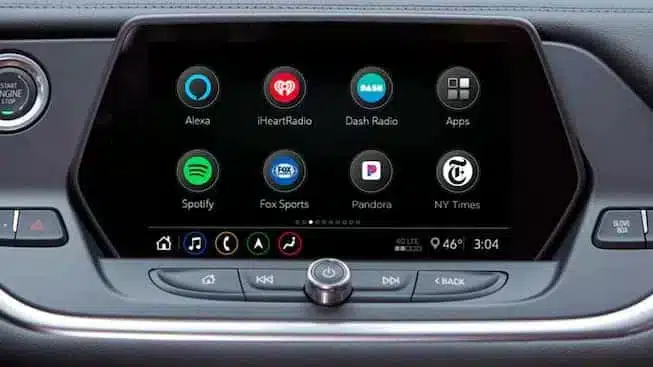 Car infotainment system display featuring various apps including Alexa, iHeartRadio, Dash Radio, Spotify, Fox Sports, Pandora, and NY Times, showing the current temperature of 46°F and time of 3:04 PM.