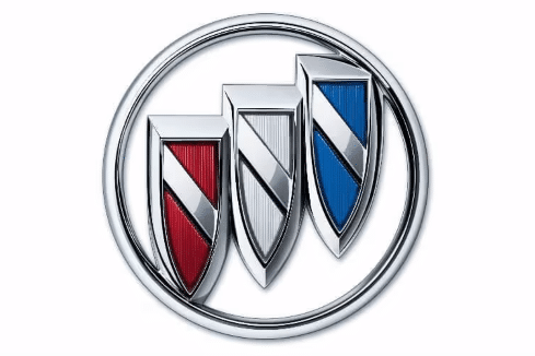 Three sleek metallic emblems featuring red, white, and blue accents, symbolizing performance and elegance in automotive design.