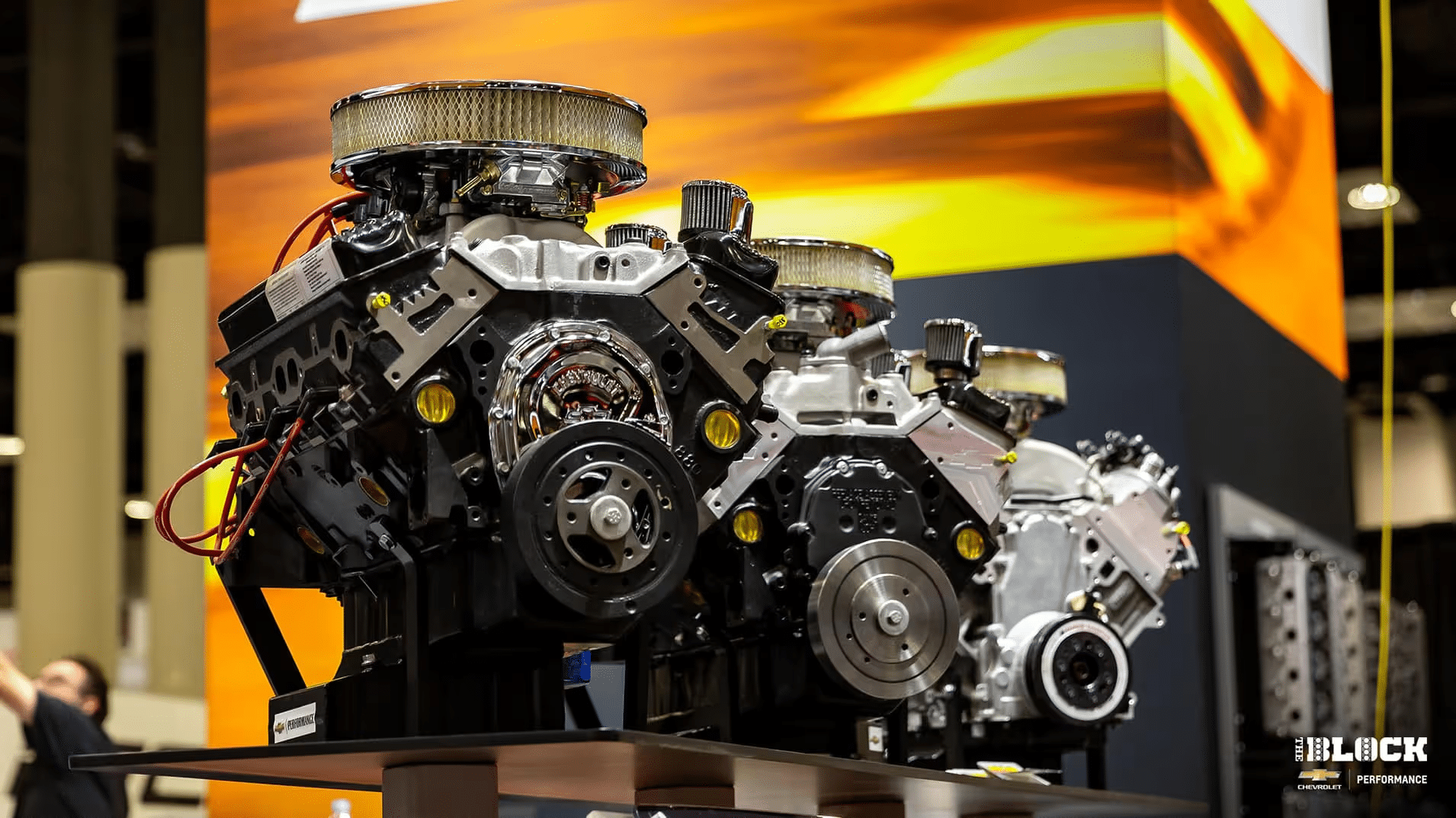 Engine compartment featuring a turbocharged LTR engine with a distinctive red and black valve cover, showcasing high-performance components and sleek design. Ideal for automotive enthusiasts and performance car builders.