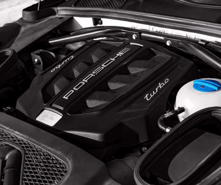 High-performance Porsche turbo engine view showcasing the V6 configuration, with detailed branding and components visible under the hood.