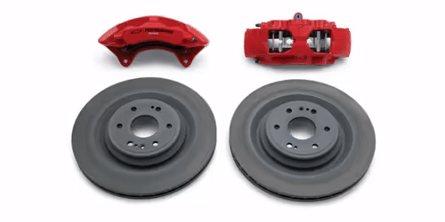 High-performance brake calipers and rotors featuring a red finish, designed for improved stopping power and responsiveness in automotive applications.