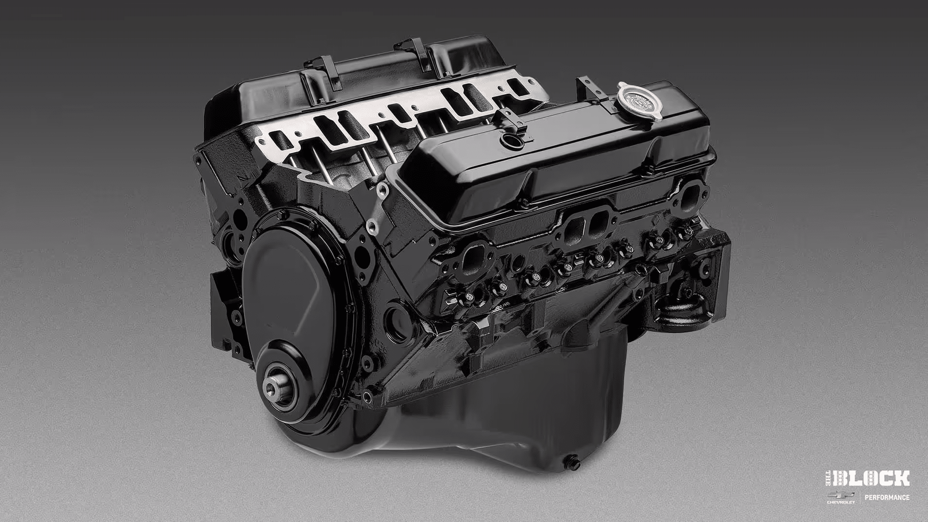 Detailed view of a Chevrolet engine block featuring a high-performance black finish, showcasing the intricate design and components, ideal for automotive enthusiasts and builders looking to enhance engine performance.