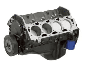 Engine block with visible cylinder openings, oil filter, and crankshaft mount, showcasing a key component of an automotive engine.
