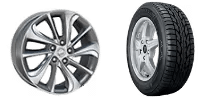 Gray alloy car wheel with five spokes next to a black tire with traction grooves.