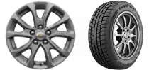 Gray alloy car wheel with five spokes next to a black tire with traction grooves.