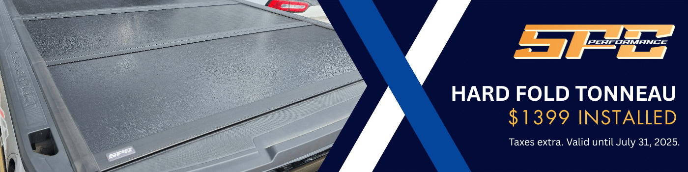 Hard fold tonneau cover on a truck, priced at $1399 installed, valid until July 31, 2025.